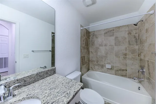 a view of a lake in front of house