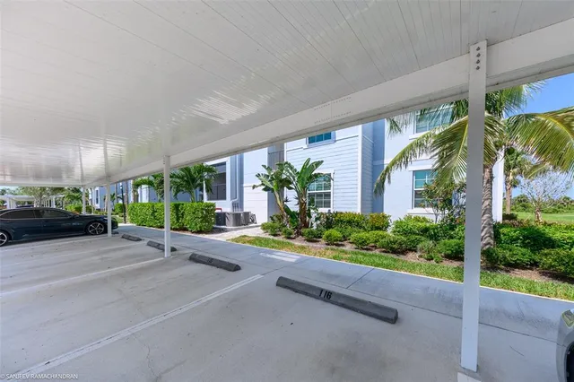 a view of a water fountain and a patio