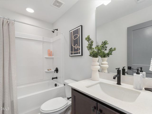 a view of entryway with wooden floor and stairs