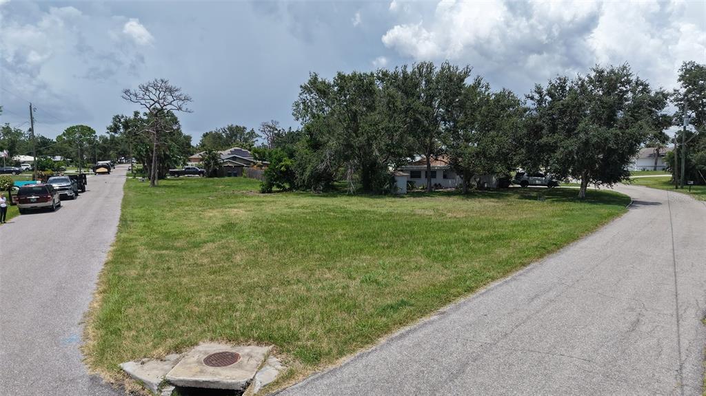 513 Pine Road Nokomis, FL 34275 - Photo 13 of 22 a view of a field with of trees