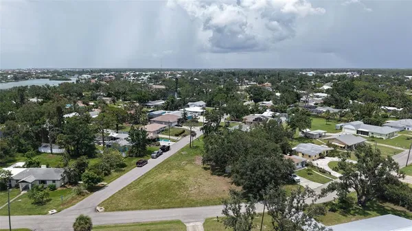 an aerial view of a city with lots of residential buildings