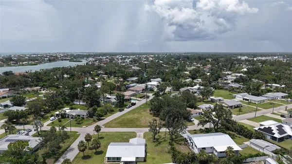 an aerial view of a city with lots of residential buildings