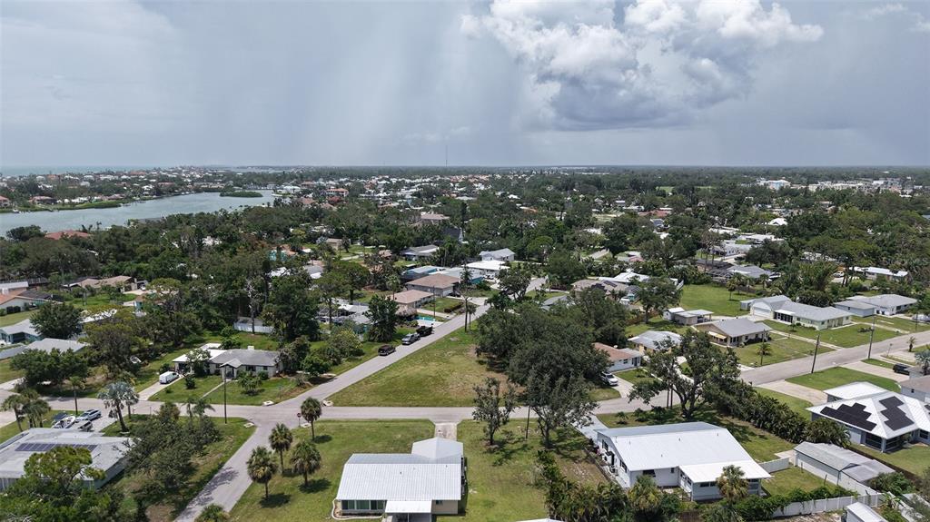 513 Pine Road Nokomis, FL 34275 - Photo 17 of 22 an aerial view of a city with lots of residential buildings