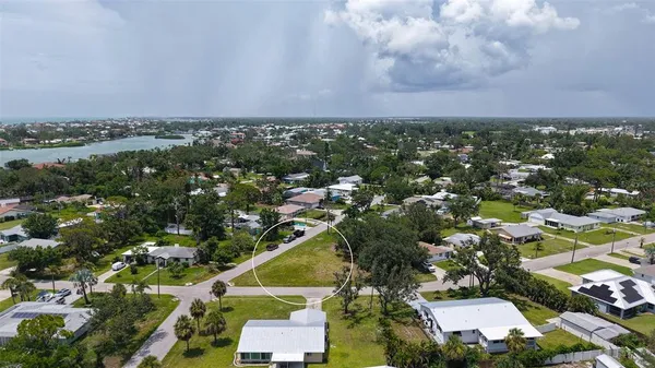 an aerial view of a city with lots of residential buildings