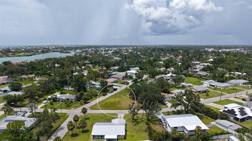 513 Pine Road Nokomis, FL 34275 - Photo 18 of 22 an aerial view of a city with lots of residential buildings