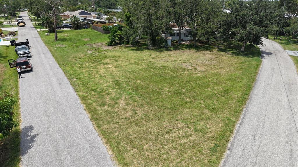 513 Pine Road Nokomis, FL 34275 - Photo 10 of 22 a view of a yard with trees