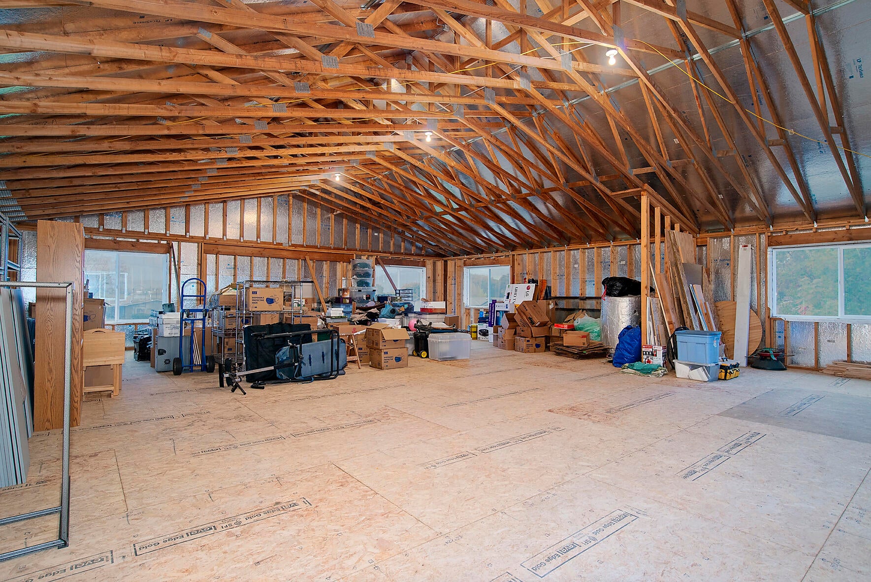 646 Raven Road Central Point, OR 97502 - Photo 63 of 74 Above the garage is an unfinished bonus room that is 1440 sq ft with 12 ft vaulted ceilings and looking out to Mt Mclaughlin; this is in addition to the sq ft of the home.
