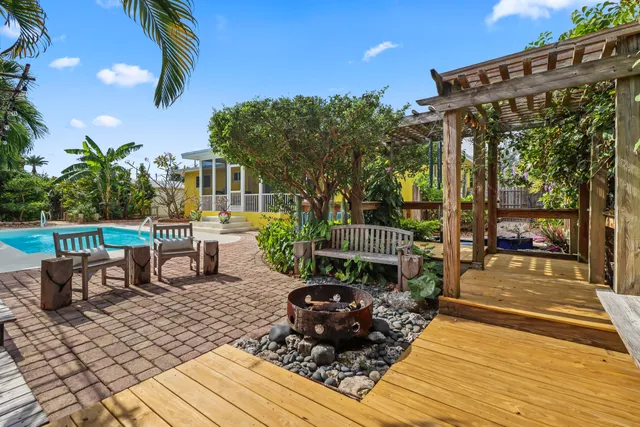 a view of a chairs and tables in the patio