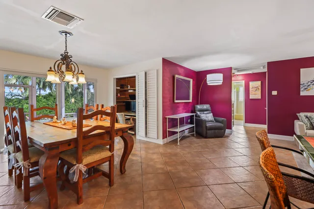 a view of a livingroom with furniture and a chandelier