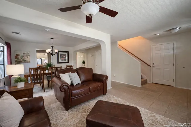 a bathroom with a sink mirror and a bathtub