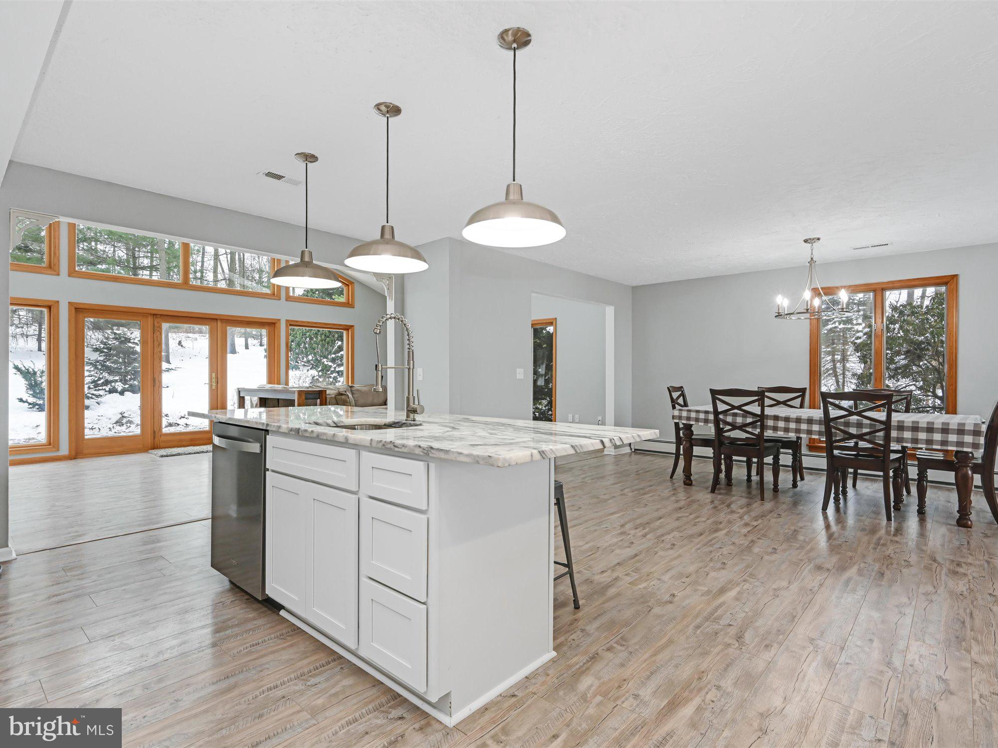 695 Fuhrman Mill Road Hanover, PA 17331 - Photo 13 of 40 Open Floor plan view of dining, sun room & kitchen