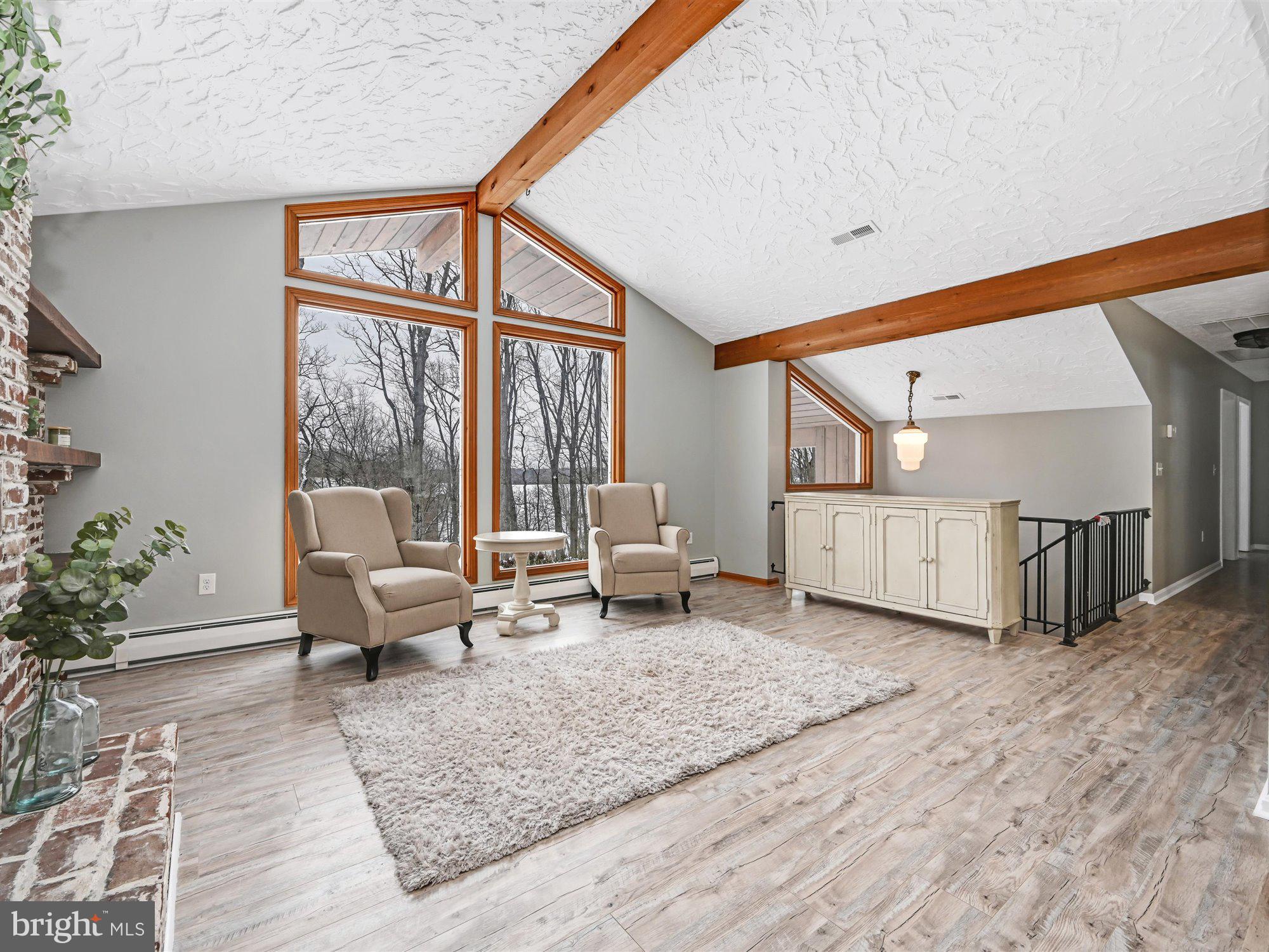 695 Fuhrman Mill Road Hanover, PA 17331 - Photo 6 of 40 Living rm w/ vaulted ceiling & beautiful view
