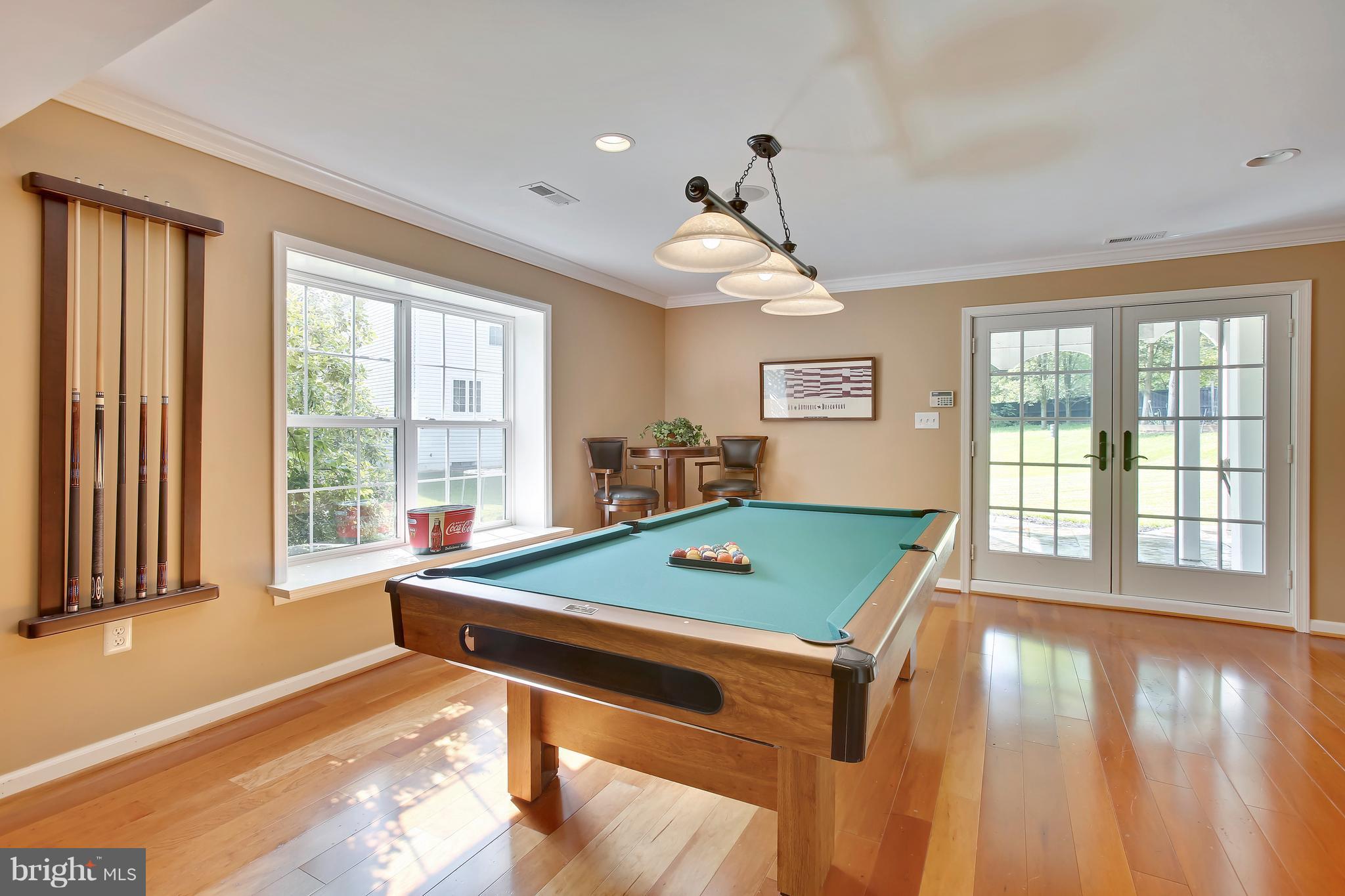 18255 Maple Spring Court Leesburg, VA 20176 - Photo 10 of 30 Double French Doors Open to Outdoor Living Spaces