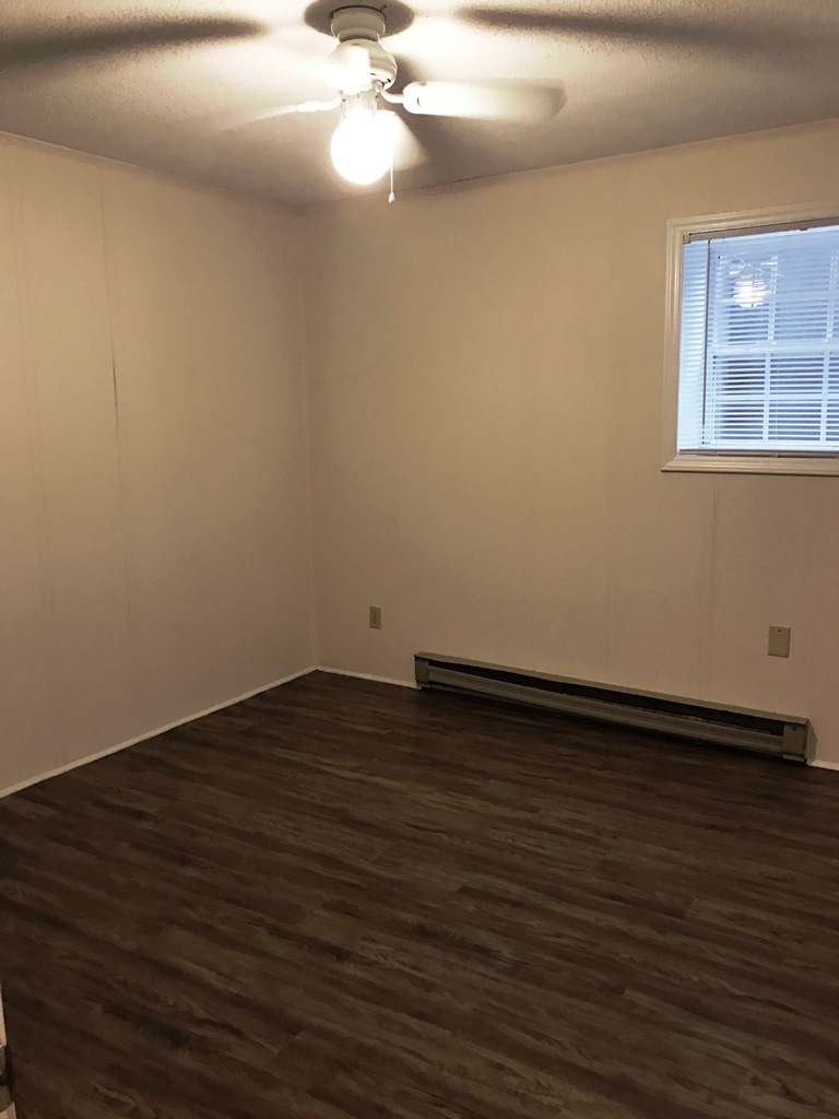 406 Old Central Road, Unit 1 Clemson, SC 29631 - Photo 4 of 8 This spacious room features ample light and a versatile layout.