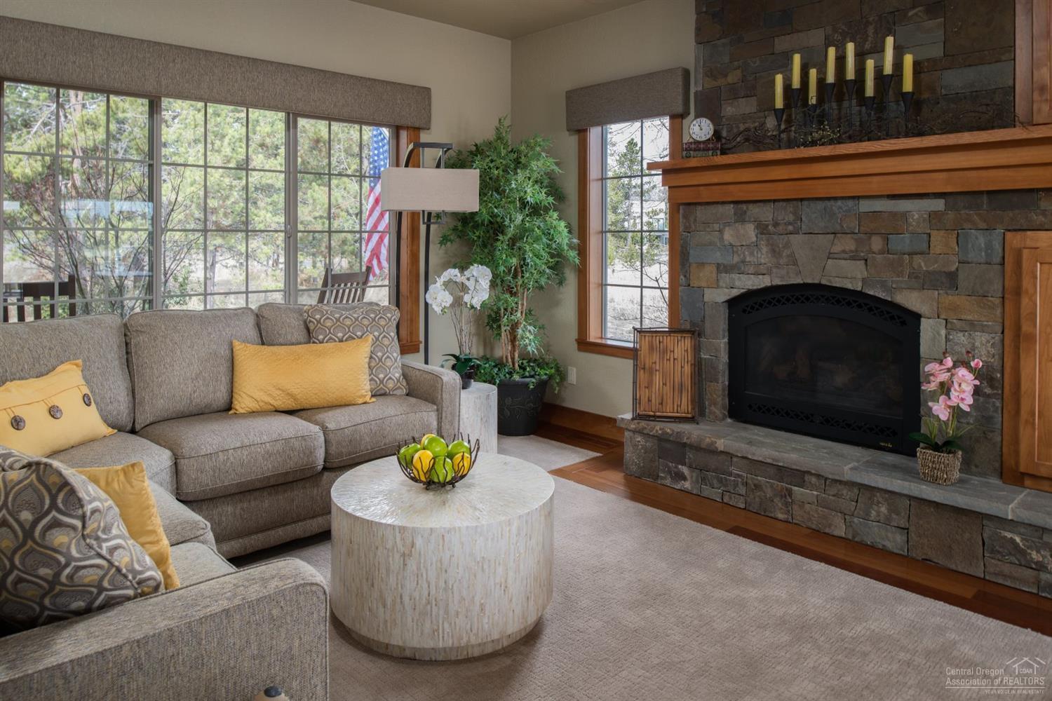 56902 River Road Sunriver, OR 97707 - Photo 8 of 24 Stacked stone surrounds the gas fireplac