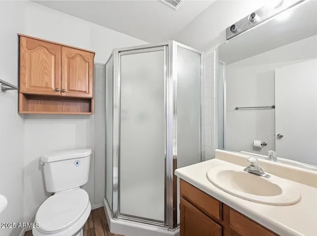 a view of a room with an empty space and hallway