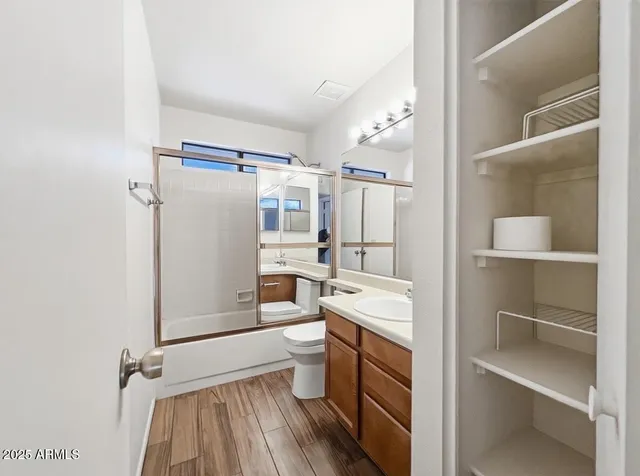 a view of bathroom with a toilet a sink and a bathtub