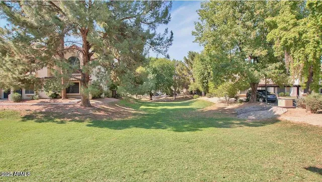 a view of a house with a yard