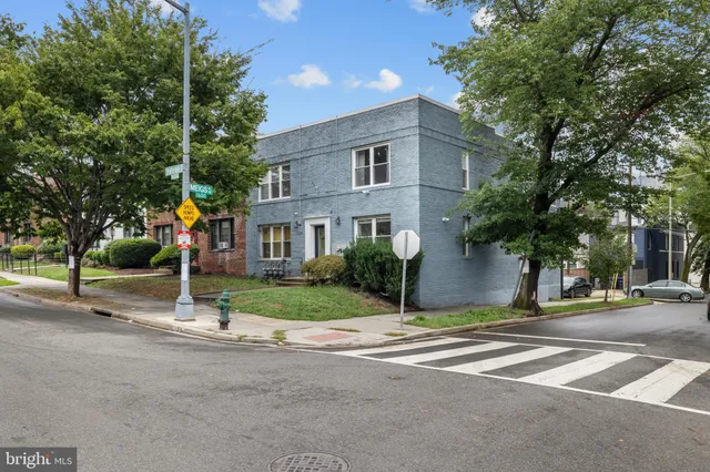 a view of street with houses
