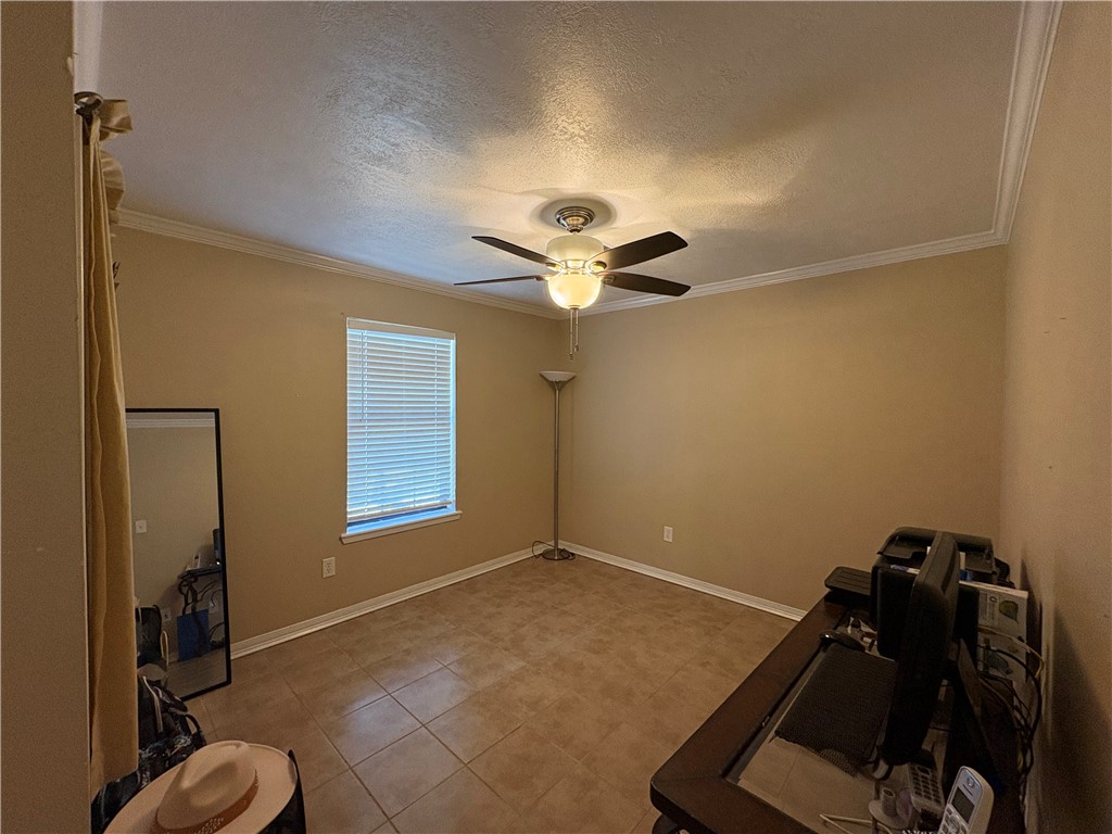 1501 Maple Drive Bryan, TX 77803 - Photo 11 of 19 a view of workspace with windows