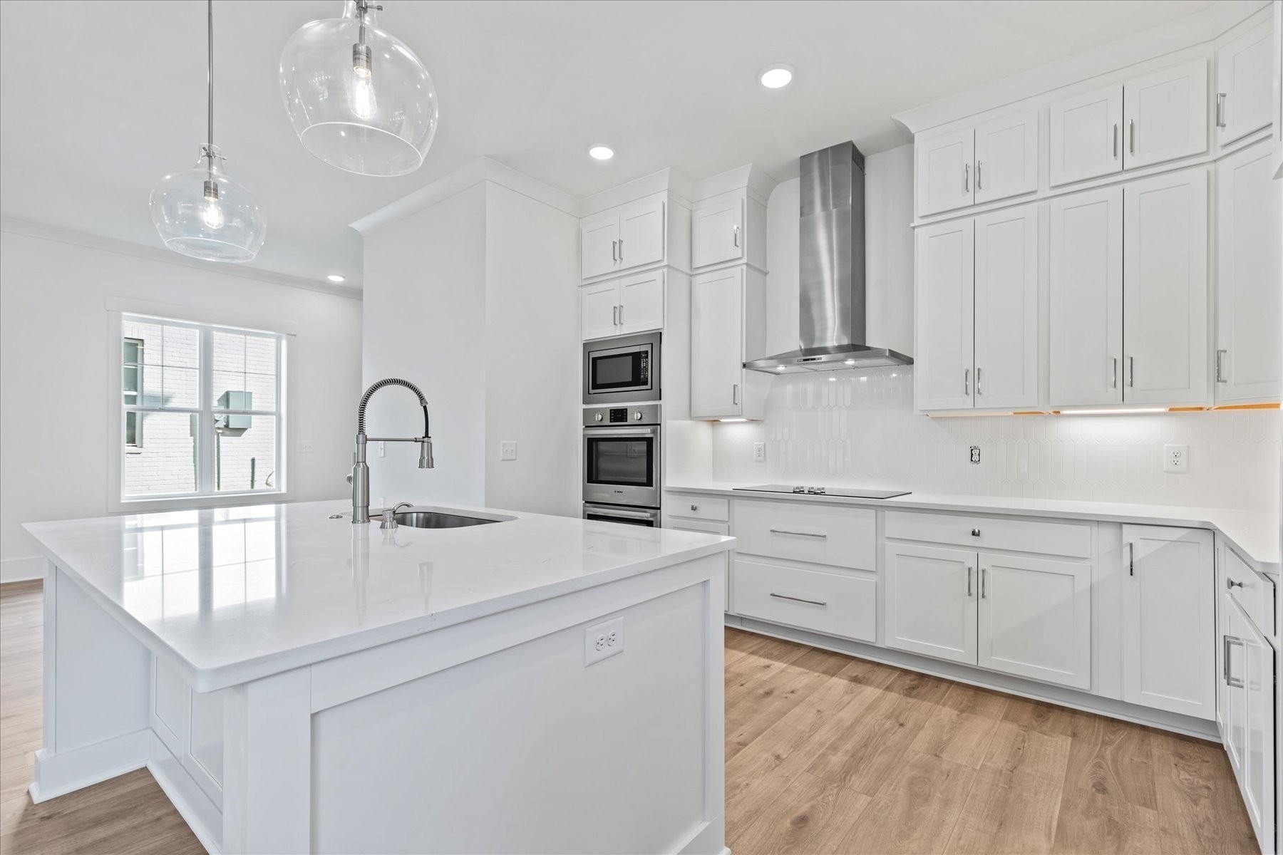 321 Old Shackle Island Road Hendersonville, TN 37075 - Photo 2 of 49 a kitchen with kitchen island white cabinets and refrigerator