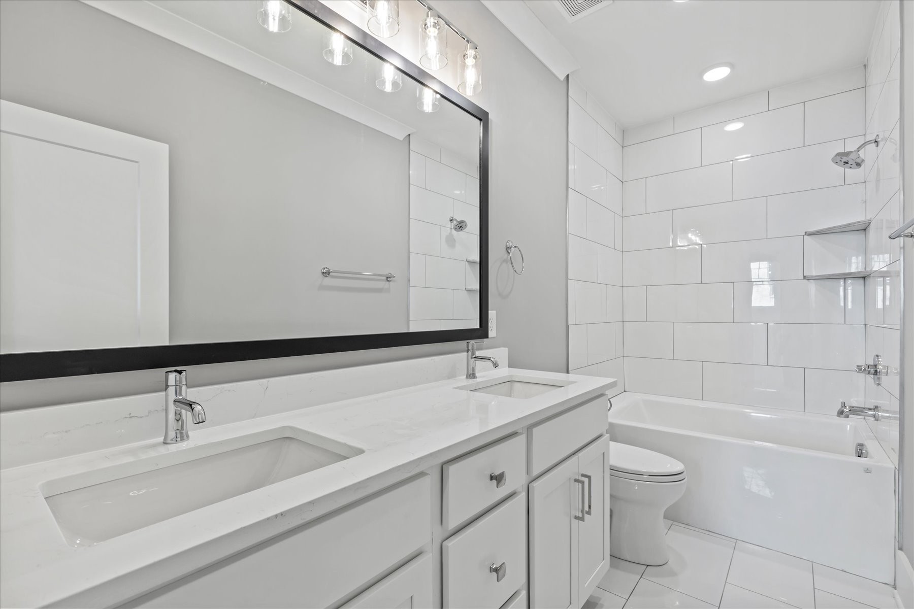 321 Old Shackle Island Road Hendersonville, TN 37075 - Photo 35 of 49 a bathroom with a sink double vanity granite toilet tub and shower