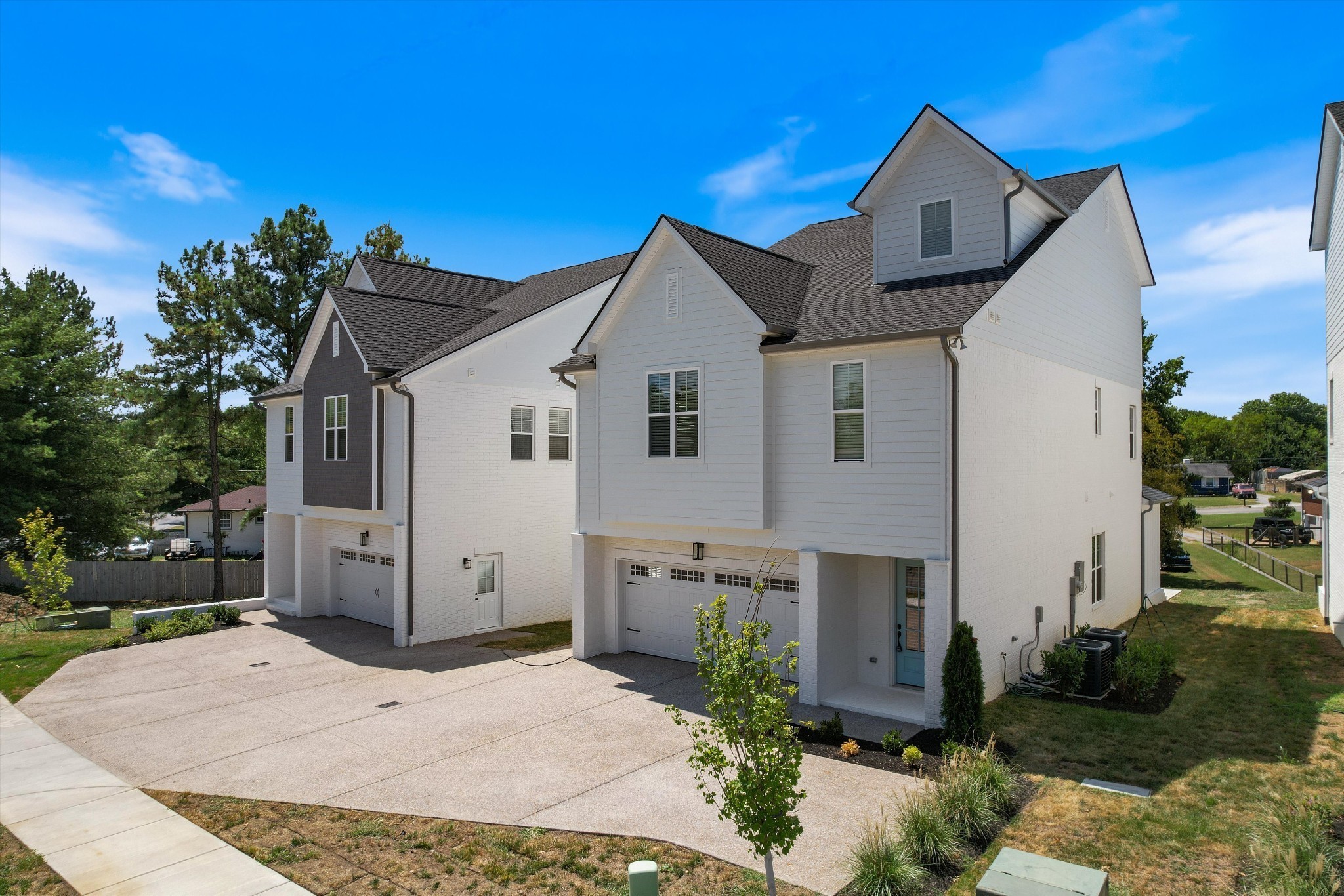 321 Old Shackle Island Road Hendersonville, TN 37075 - Photo 4 of 49 a front view of a house with a yard