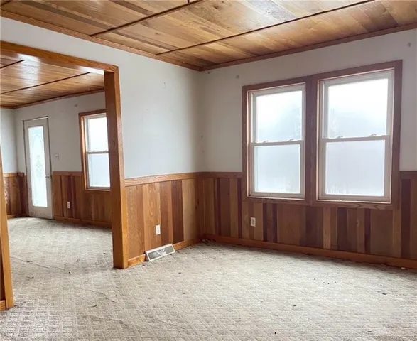 an empty room with windows