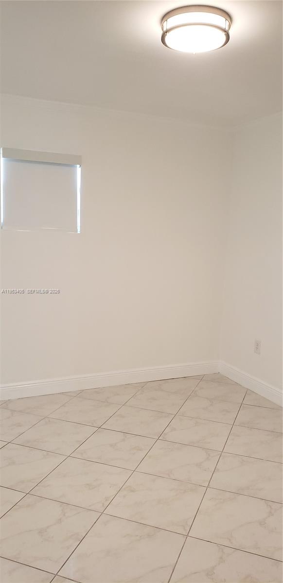 11242 Southwest 62nd Lane, Unit 11242 Miami, FL 33173 - Photo 33 of 58 a view of an empty room