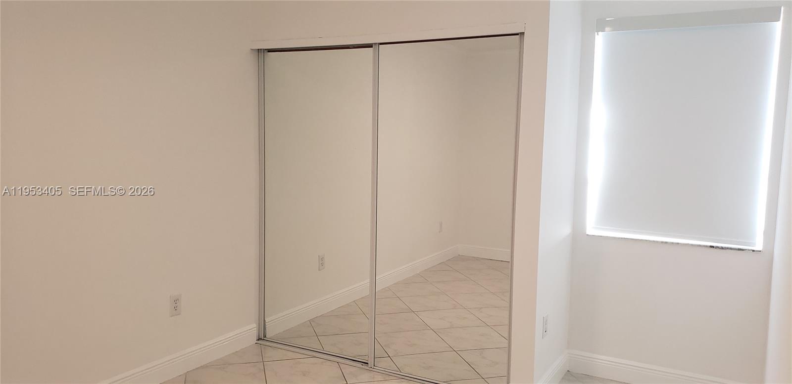 11242 Southwest 62nd Lane, Unit 11242 Miami, FL 33173 - Photo 36 of 58 a view of an empty room