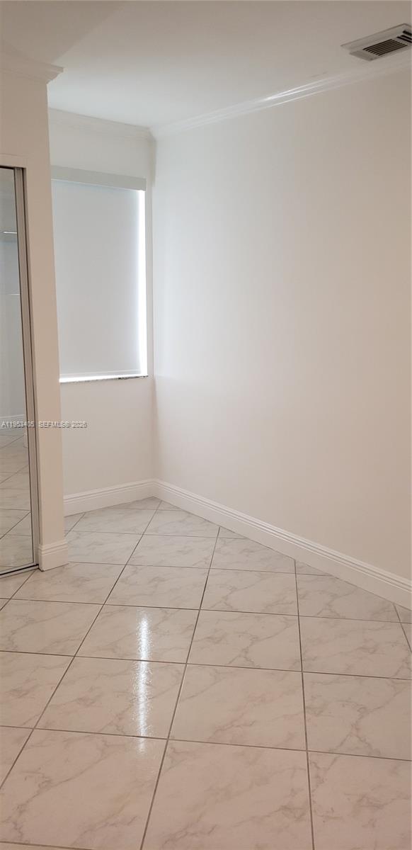 11242 Southwest 62nd Lane, Unit 11242 Miami, FL 33173 - Photo 38 of 58 a view of an empty room