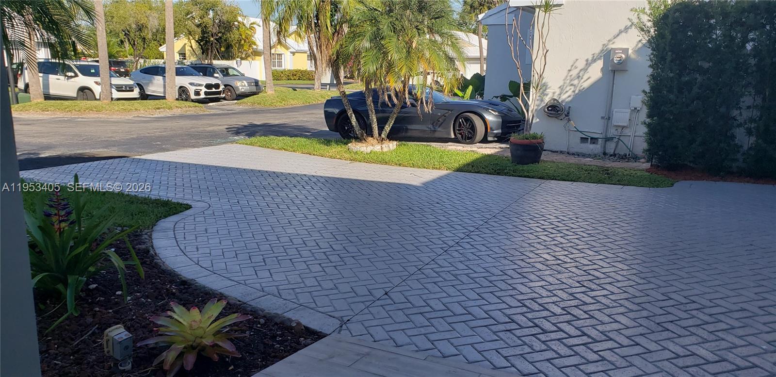 11242 Southwest 62nd Lane, Unit 11242 Miami, FL 33173 - Photo 4 of 58 a view of yard with cars parked