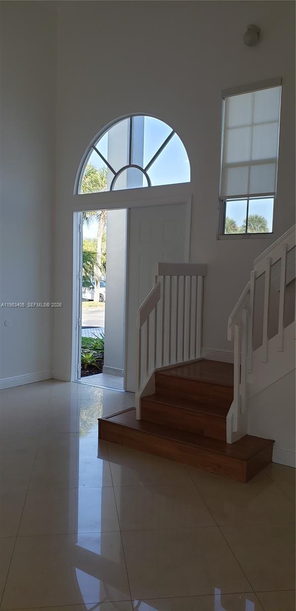 11242 Southwest 62nd Lane, Unit 11242 Miami, FL 33173 - Photo 43 of 58 a view of entryway and hall with wooden floor