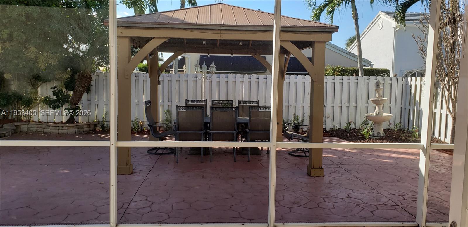 11242 Southwest 62nd Lane, Unit 11242 Miami, FL 33173 - Photo 48 of 58 an outdoor view of house with outdoor space