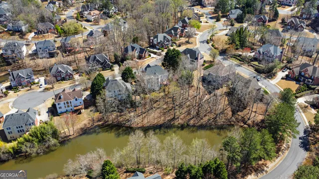 an aerial view of a city with mountains