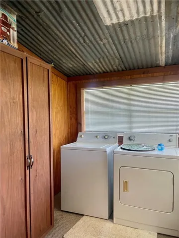 a view of a yard with a large trees