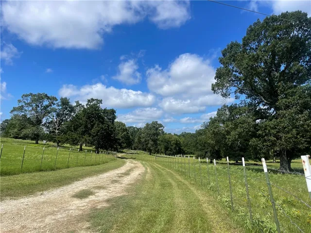 a view of a golf course with a lake
