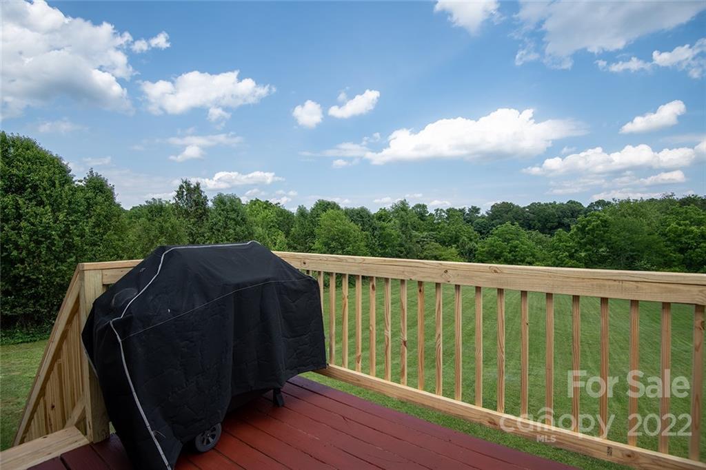 4226 Hickory Nut Ridge Road Hudson, NC 28638 - Photo 6 of 20 a balcony with wooden floor in back yard