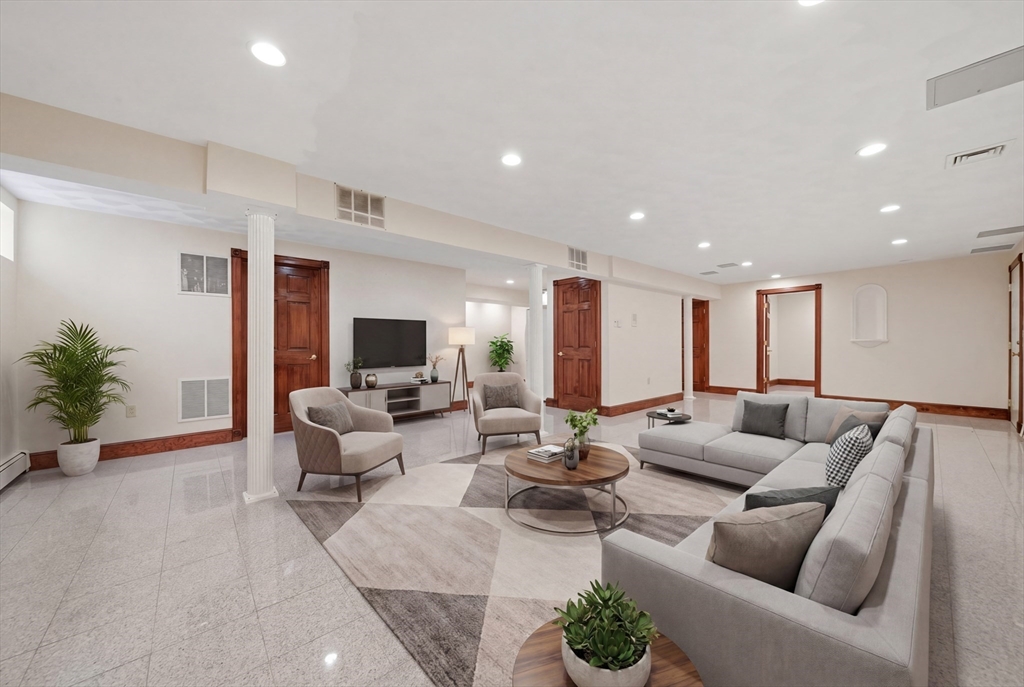 131 Range Heights Road Lynn, MA 01904 - Photo 26 of 36 a living room with furniture and a large window