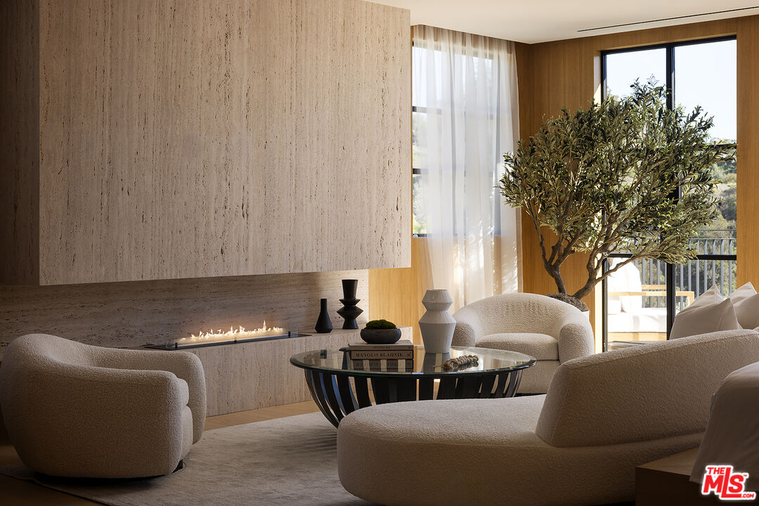 1165 Somera Road Los Angeles, CA 90077 - Photo 19 of 44 a living room with furniture and a large window