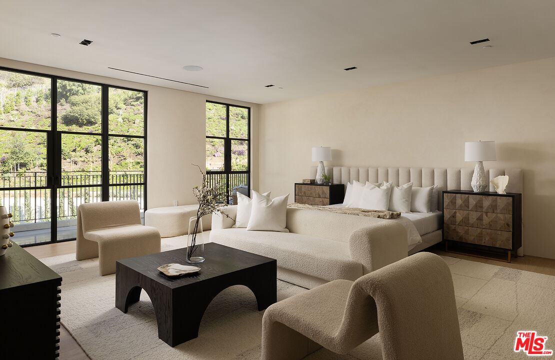 1165 Somera Road Los Angeles, CA 90077 - Photo 28 of 44 a living room with furniture and a large window