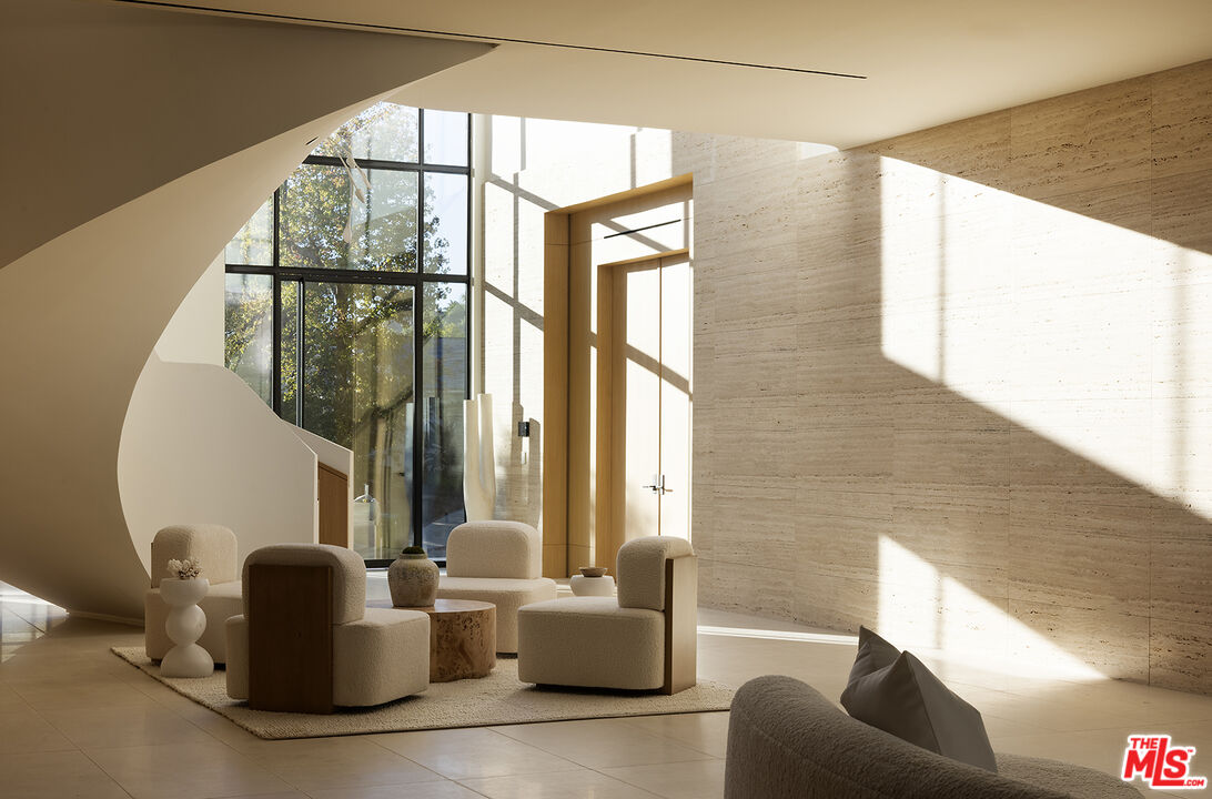 1165 Somera Road Los Angeles, CA 90077 - Photo 3 of 44 a living room with furniture and a window