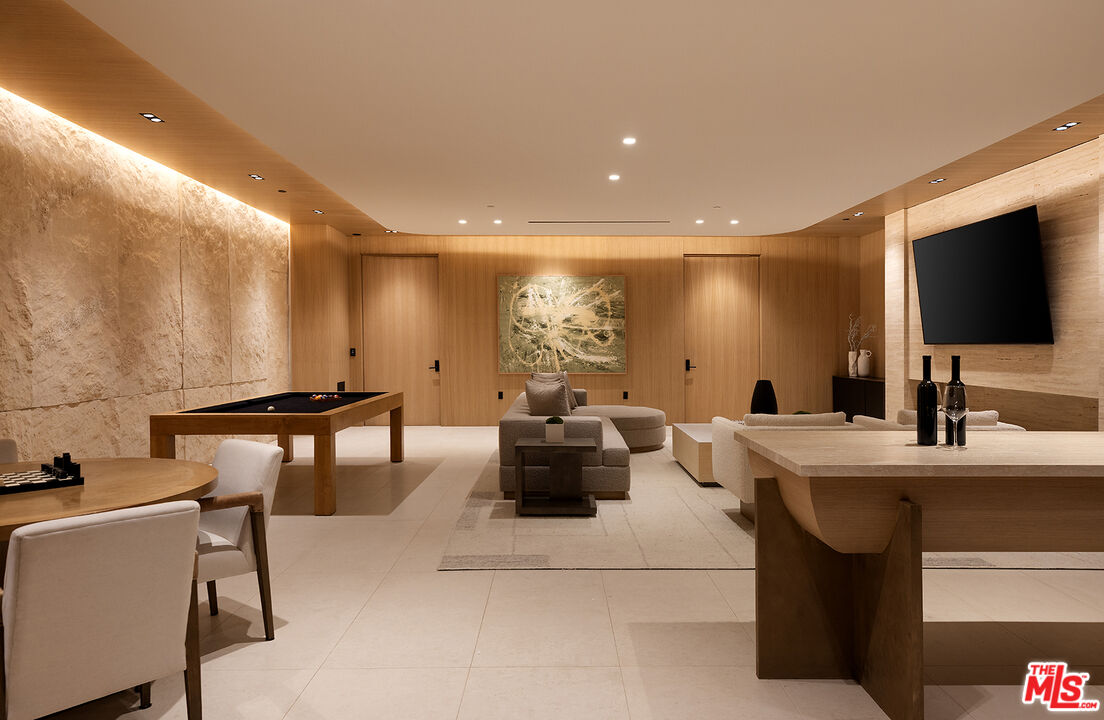 1165 Somera Road Los Angeles, CA 90077 - Photo 33 of 44 a kitchen with a sink and a refrigerator