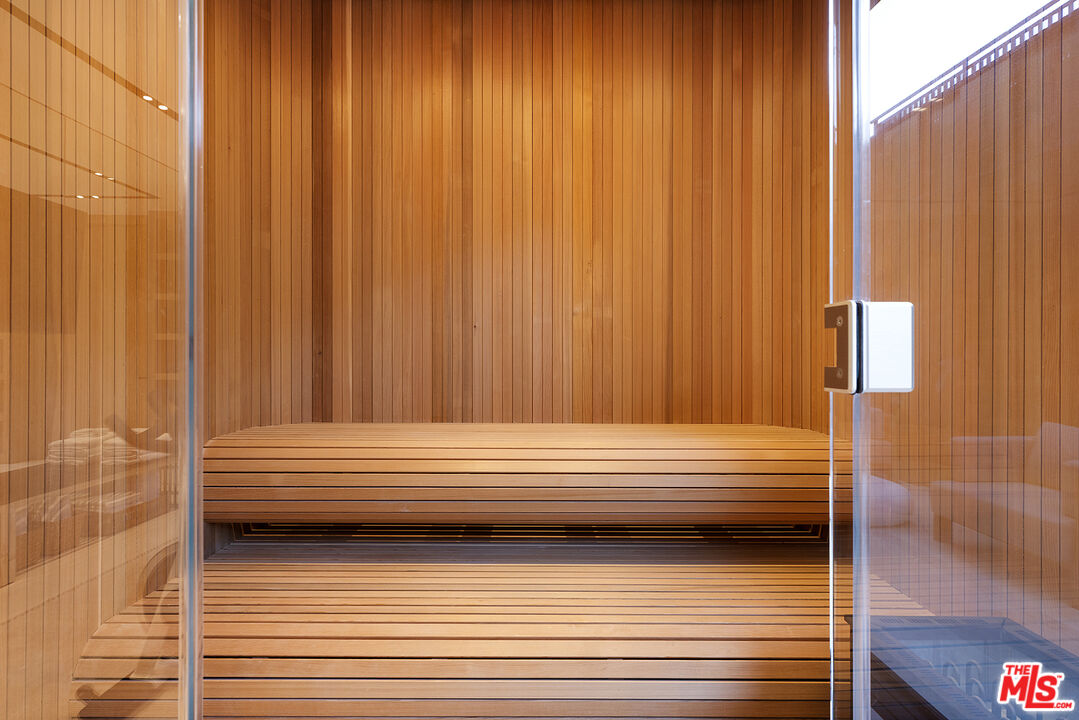 1165 Somera Road Los Angeles, CA 90077 - Photo 38 of 44 a view of sitting area with wooden walls