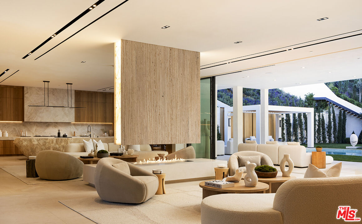 1165 Somera Road Los Angeles, CA 90077 - Photo 6 of 44 a living room with furniture and a large window