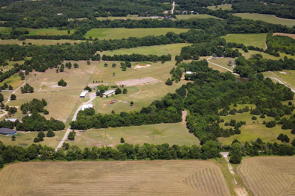 Lot 1 Edwards Road Van Alstyne, TX 75495 - Photo 2 of 5 an aerial view of ocean with residential house and lake view