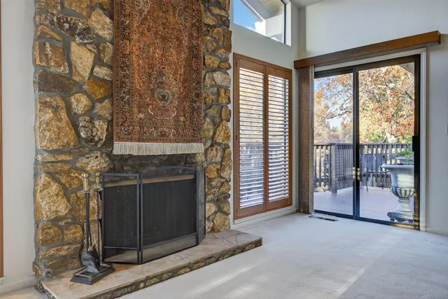 a living room with a fireplace