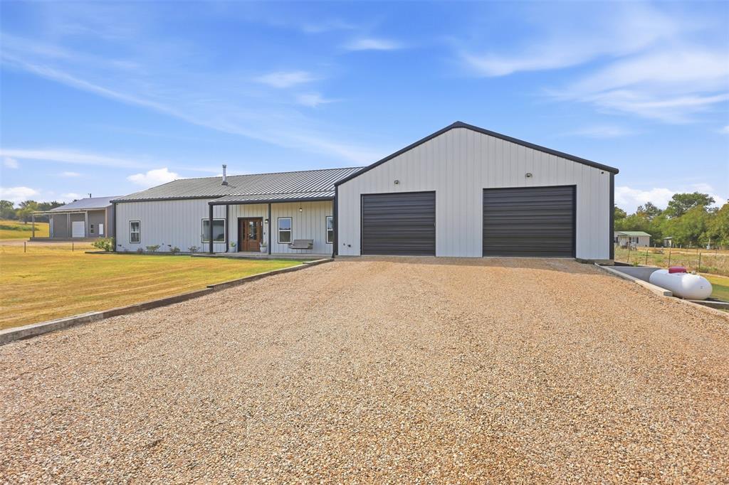 208 Chicken Field Road Whitewright, TX 75491 - Photo 2 of 40 Attached 60x40 garage/shop