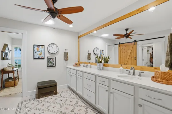 a room with furniture and a flat screen tv