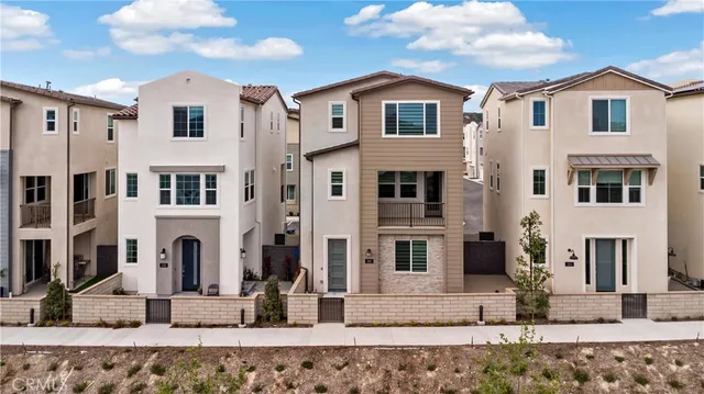 a front view of a house with street